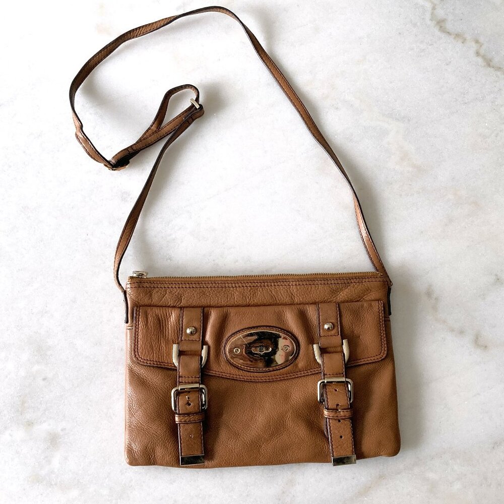 Danier leather tan / camel brown crossbody leather purse, gold hardware, buckles
